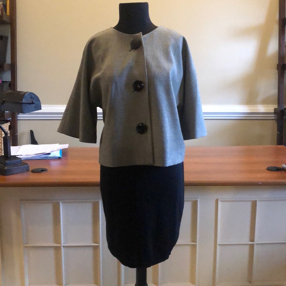 Black and white dress shirt and black skirt
